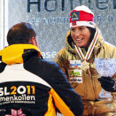 Kronprinsen deler ut premiene etter langrenn 2 x 7,5 km med skibytte, der Marit Bjørgen  vant sitt andre gull i mesterskapet. (Foto: Lise Åserud / Scanpix)    